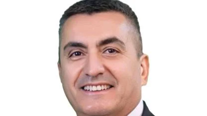 Adnan Fişenk kimdir?